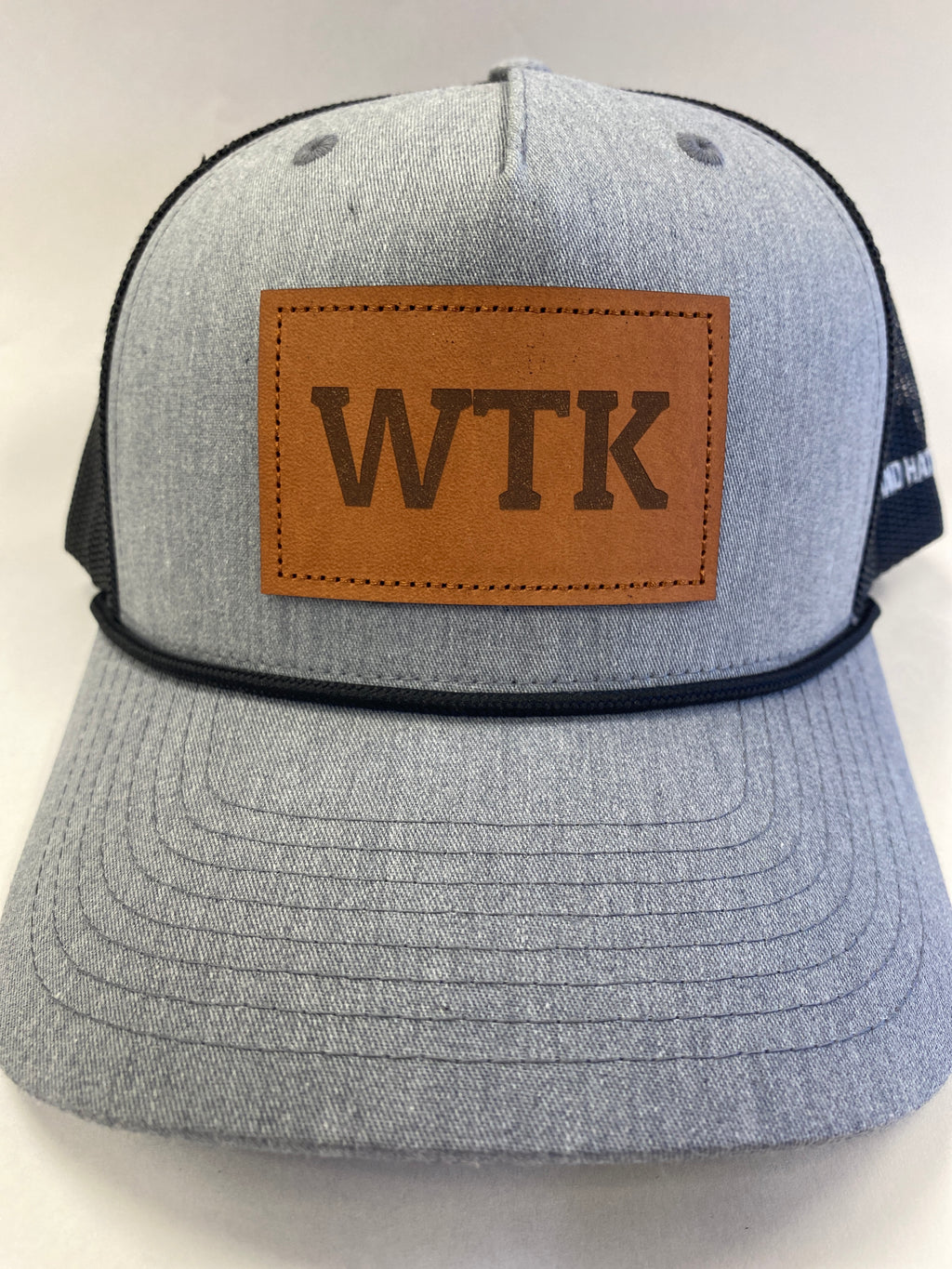 Leather Patch WTK Trucker Hat in black rope