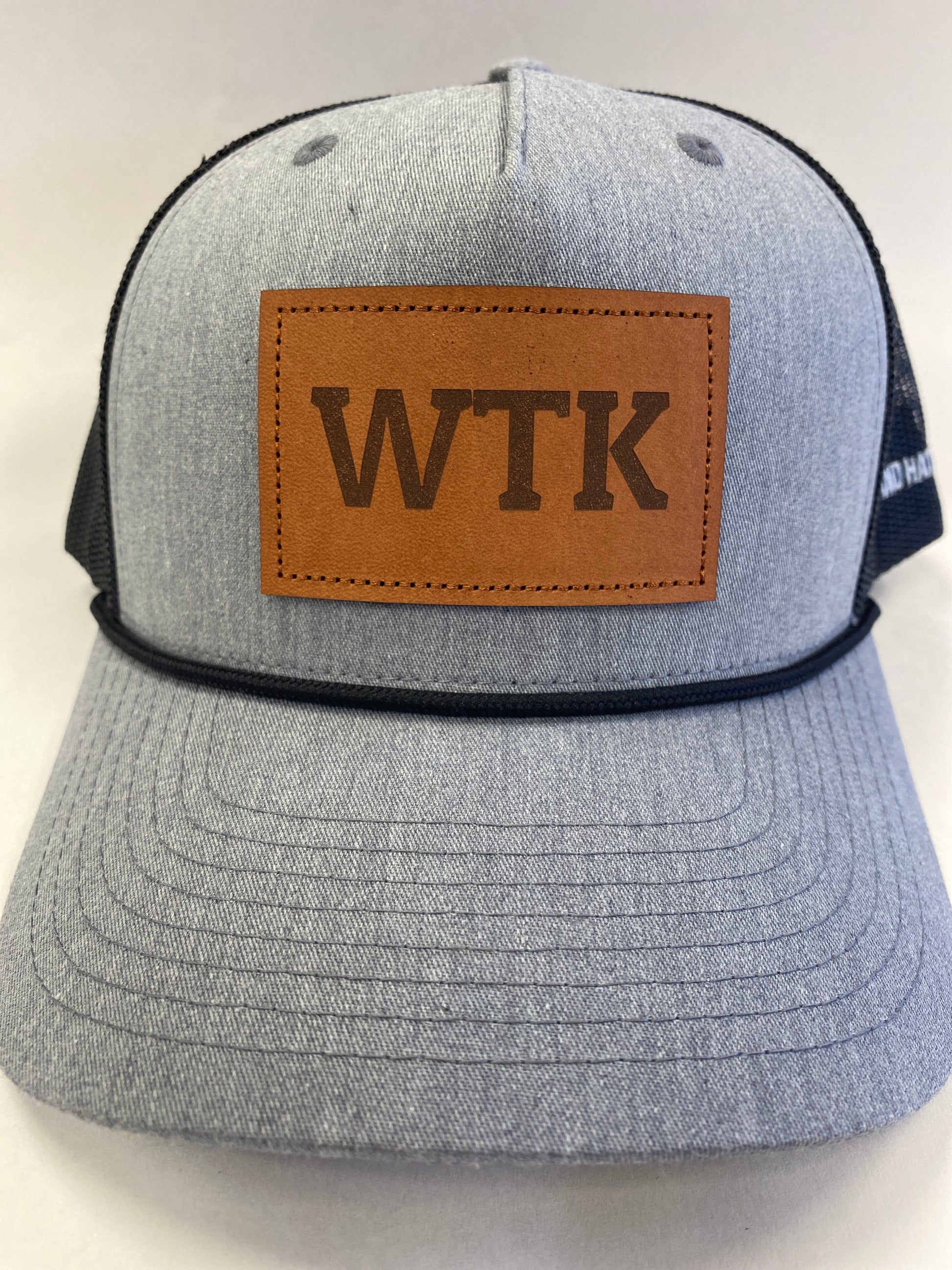 Leather Patch WTK Trucker Hat in black rope