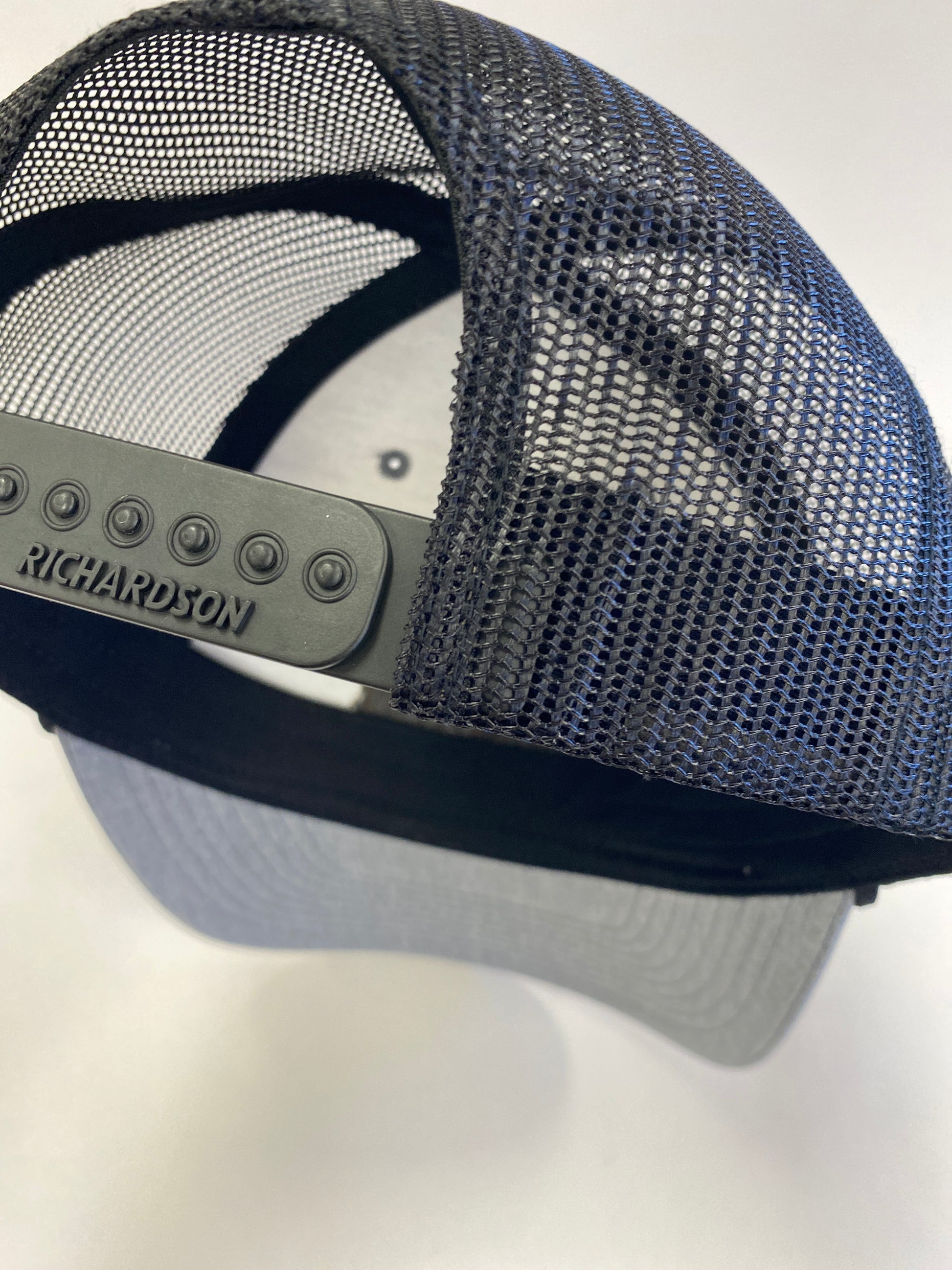 Leather Patch WTK Trucker Hat in black rope