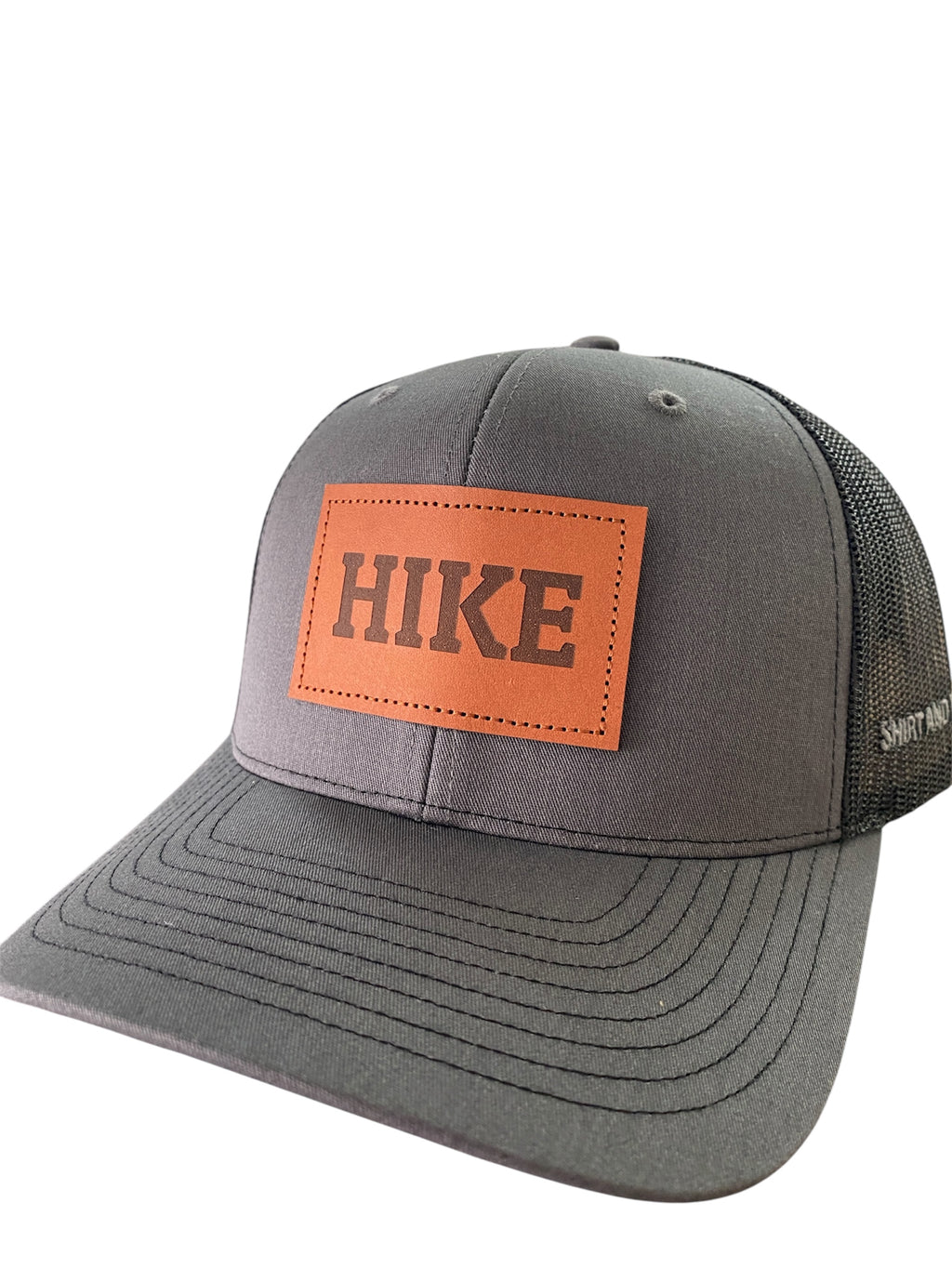 Leather Patch HIKE Trucker Hat in charcoal/