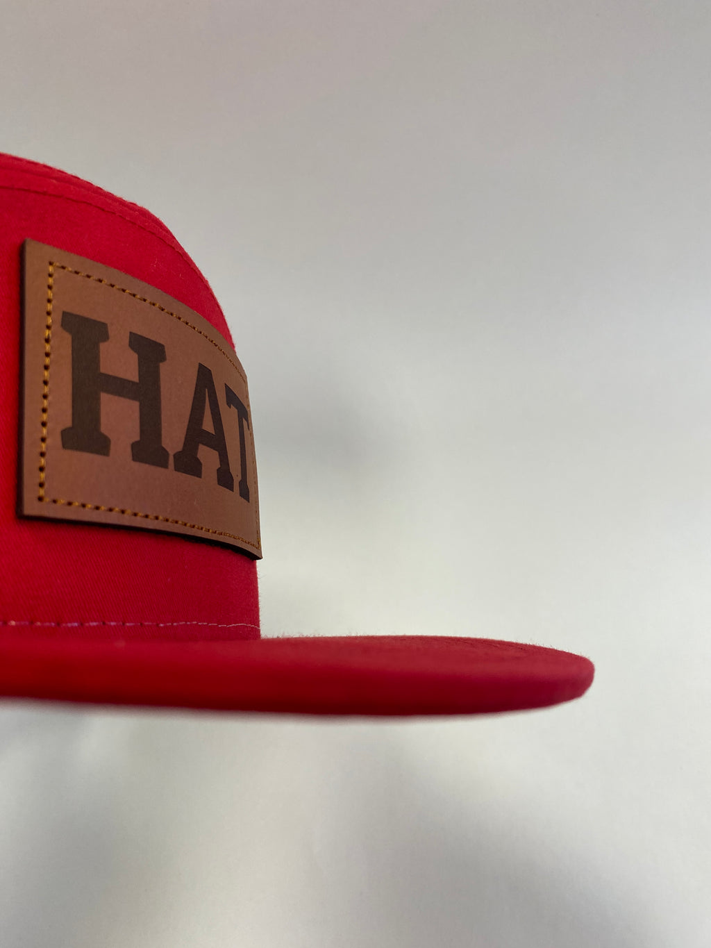 Richardson flat bill leather patch HAT in red and black
