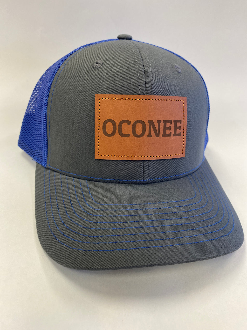 Leather Patch OCONEE Trucker Hat in charcoal/blue
