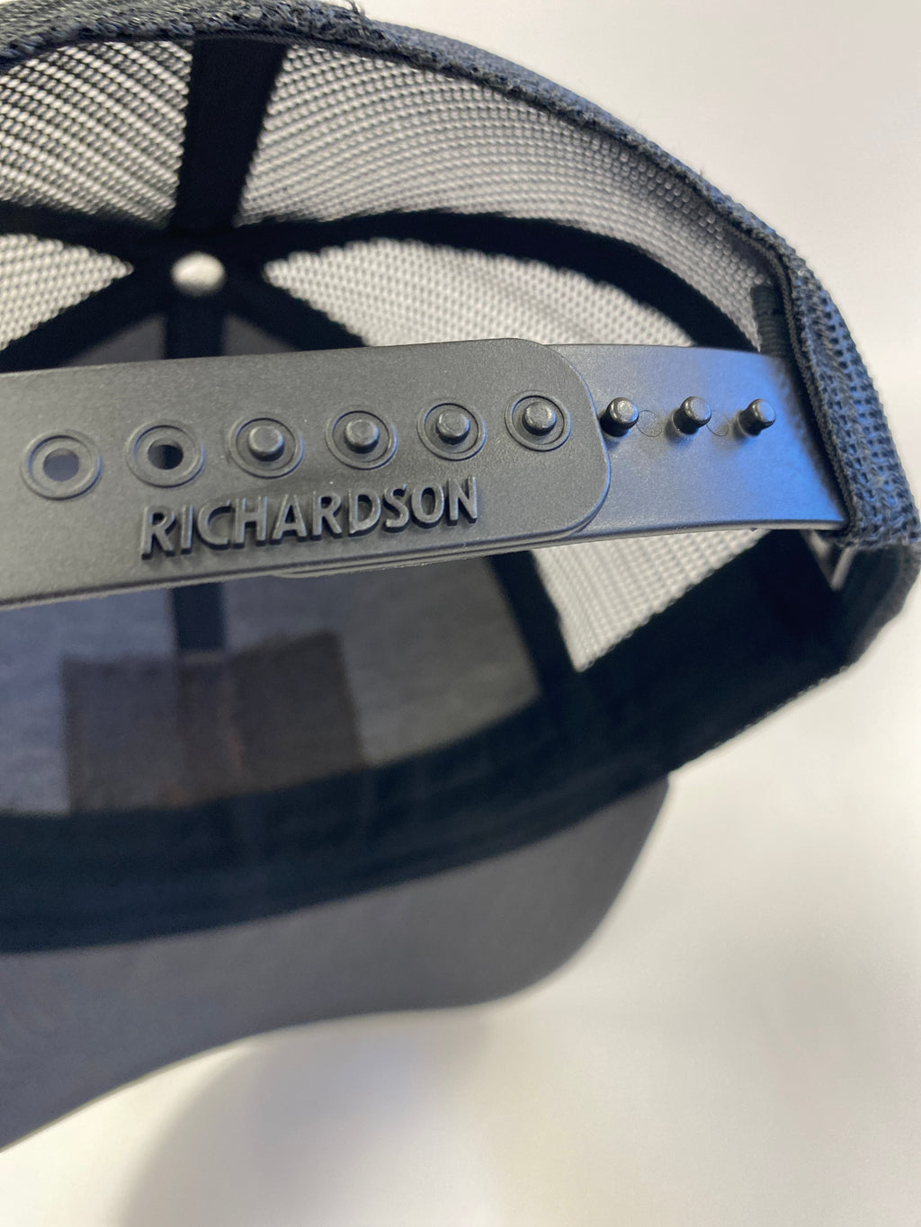 Leather Patch BACK 40 Trucker Hat in charcoal/black