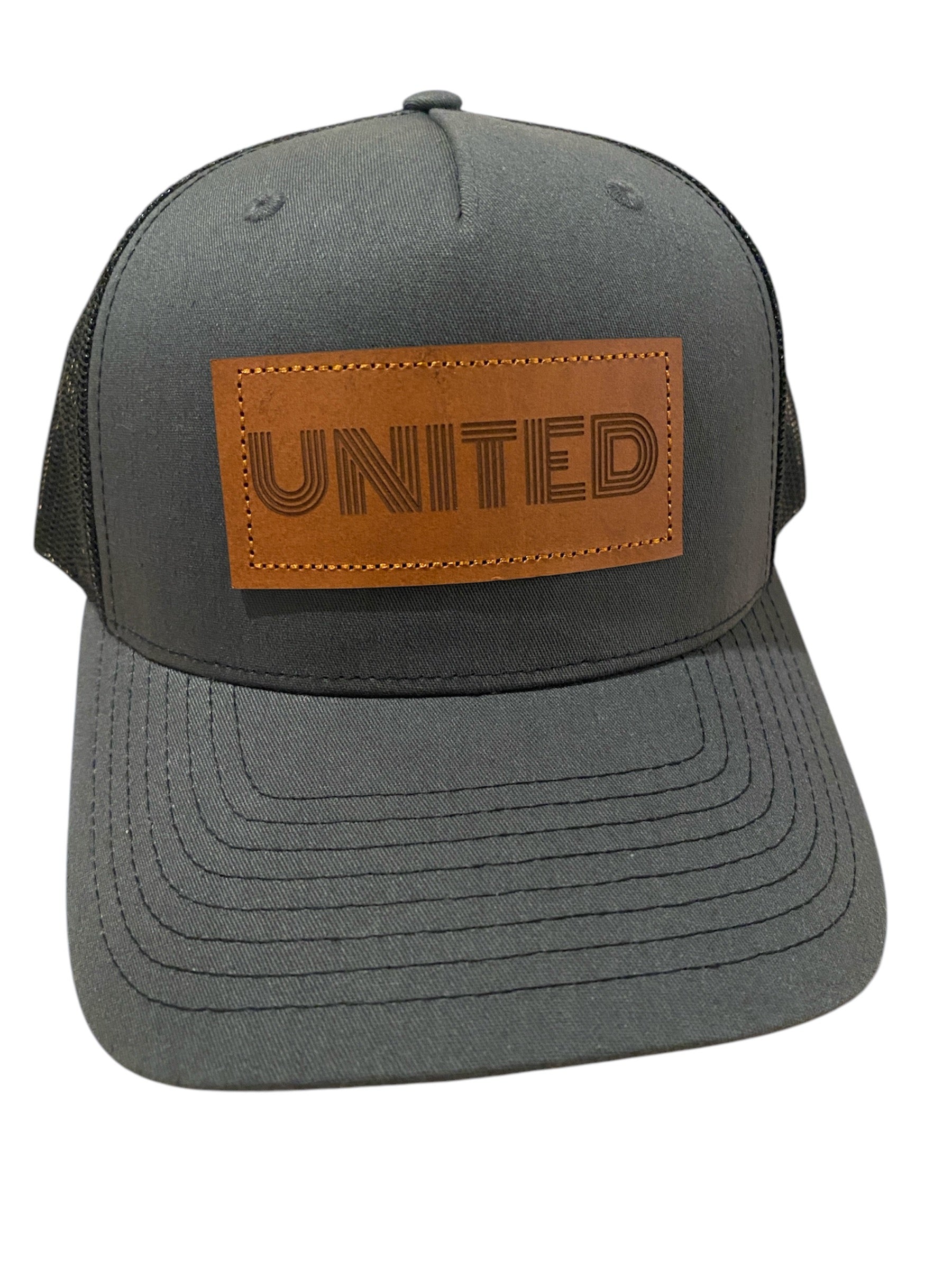 Leather Patch UNITED Trucker Hat in charcoal/black