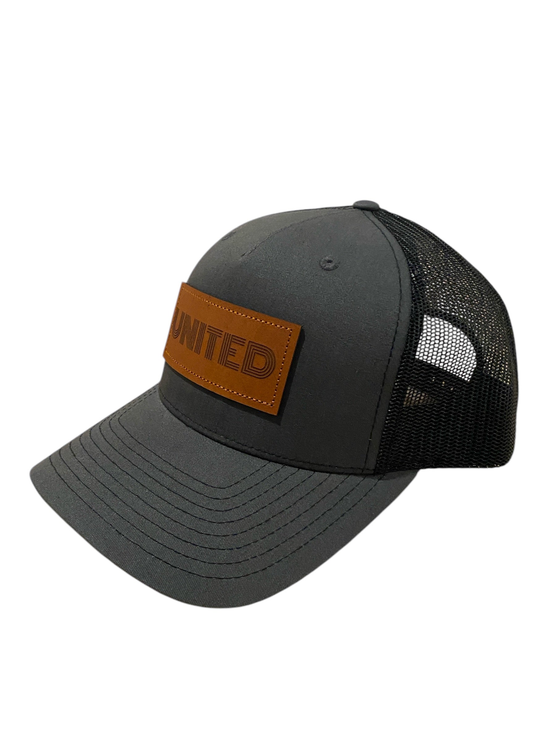 Leather Patch UNITED Trucker Hat in charcoal/black