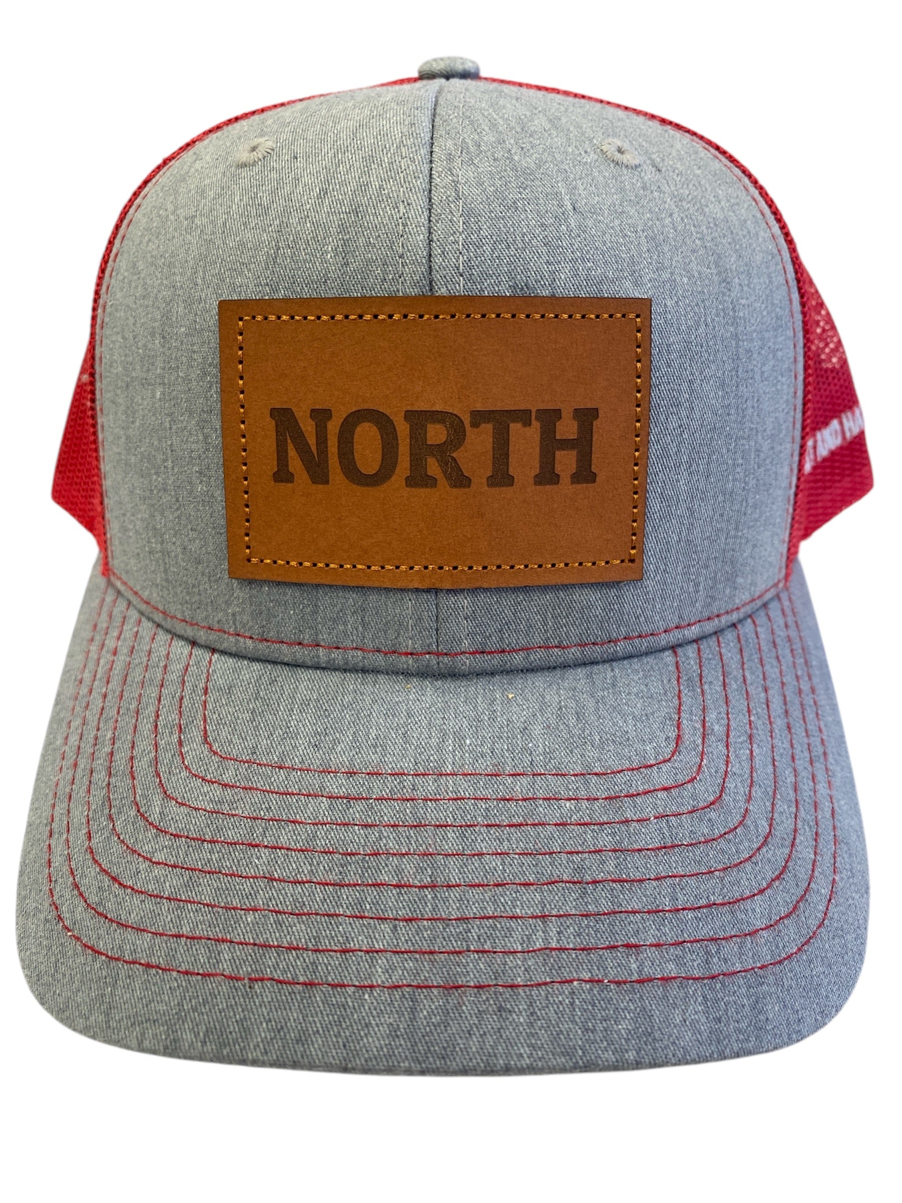 Leather Patch NORTH Trucker Hat in heather gray/red mesh