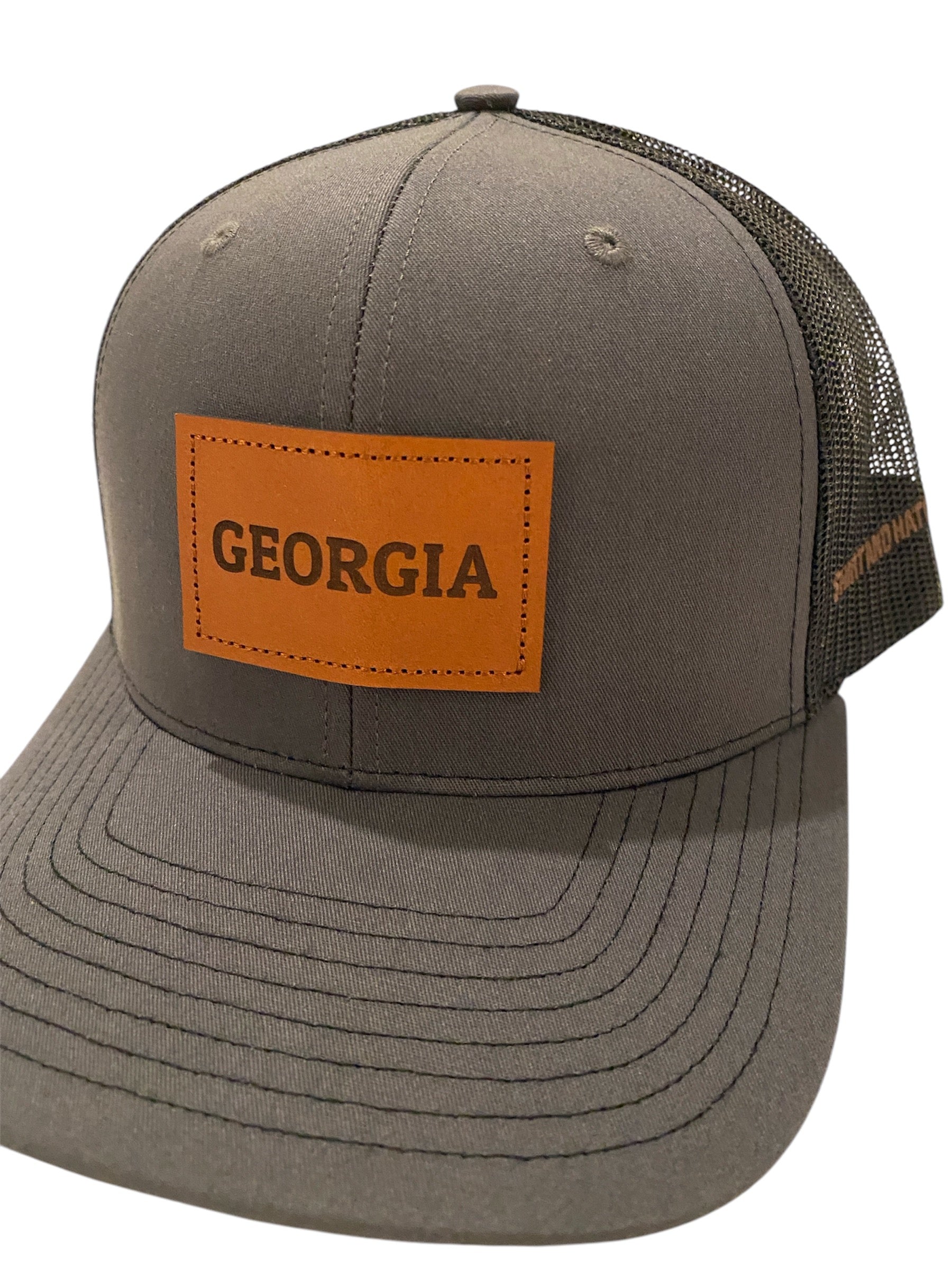 Leather Patch GEORGIA Trucker Hat in charcoal/black